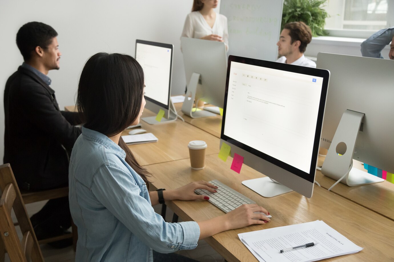 The SEO Attract team collaborating on a client's digital marketing strategy